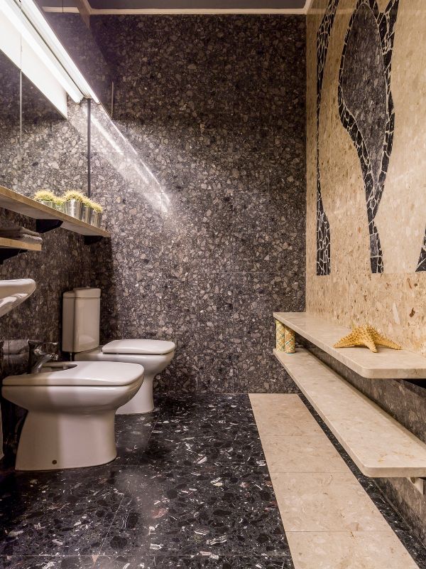 Floor and wall mosaic tiles in bathroom